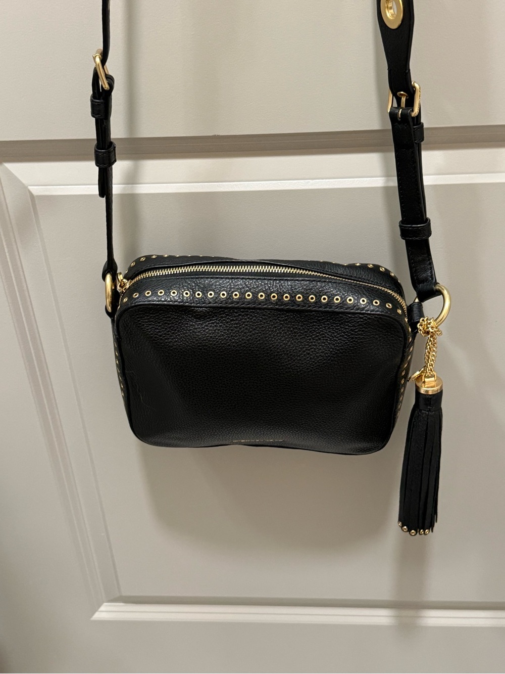 Michael Kors Black Leather Crossbody with Gold Stud Trim and Tassel